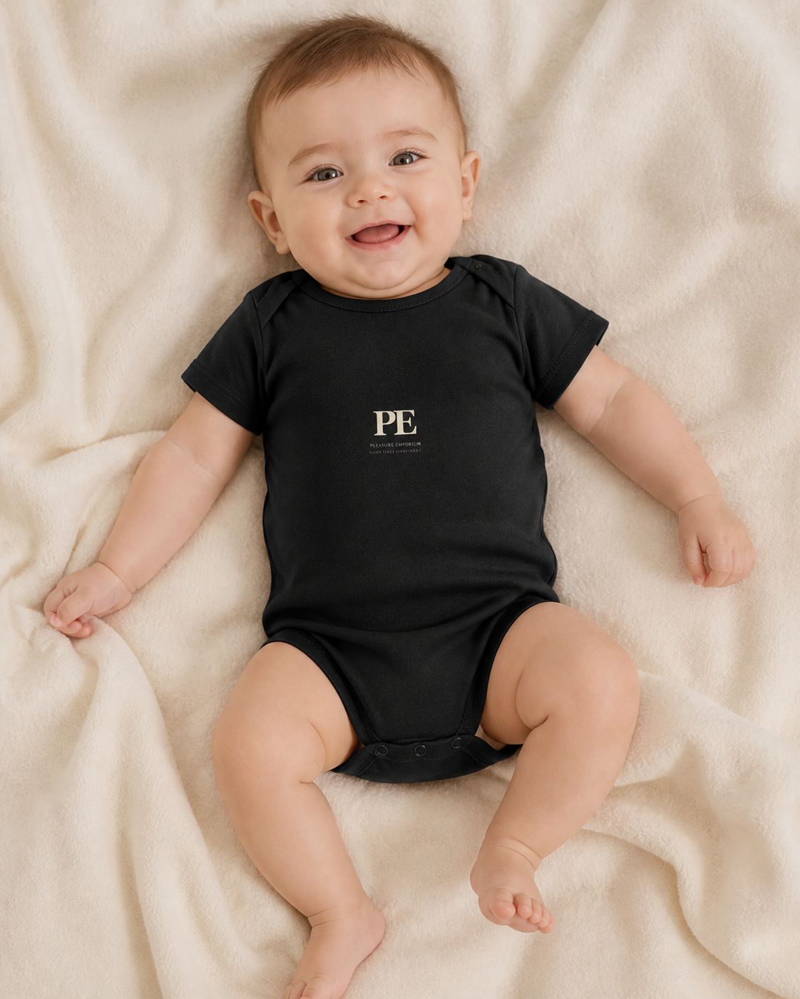 PE Baby Monogram Organic Bodysuit in Black - model photograph