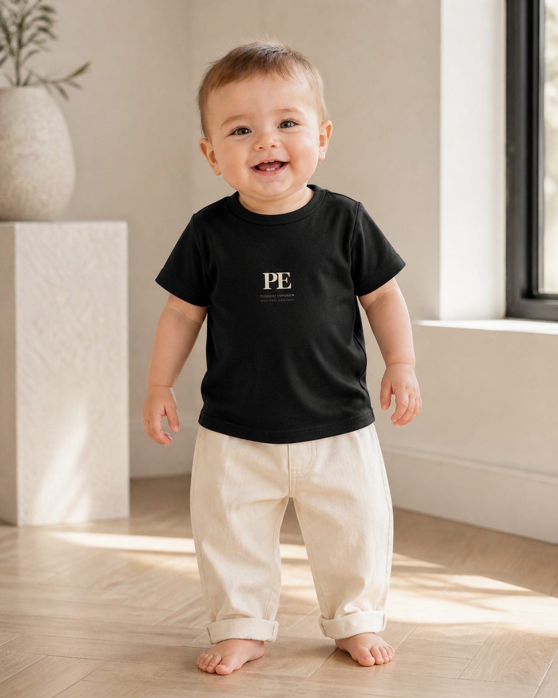 PE Baby Monogram Organic T-Shirt in Black - model photograph
